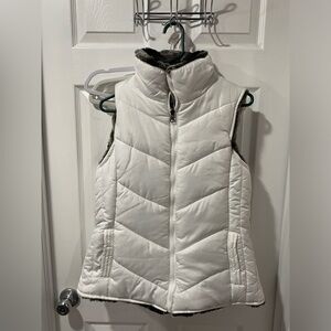 Reversible puffer vest, faux fur one side, white poly on other, size L